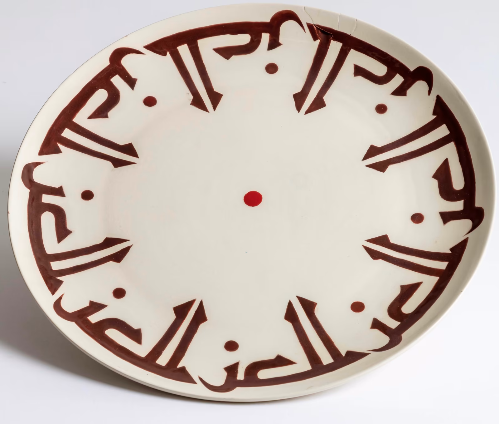 Kufic calligraphy on a ceramic plate
