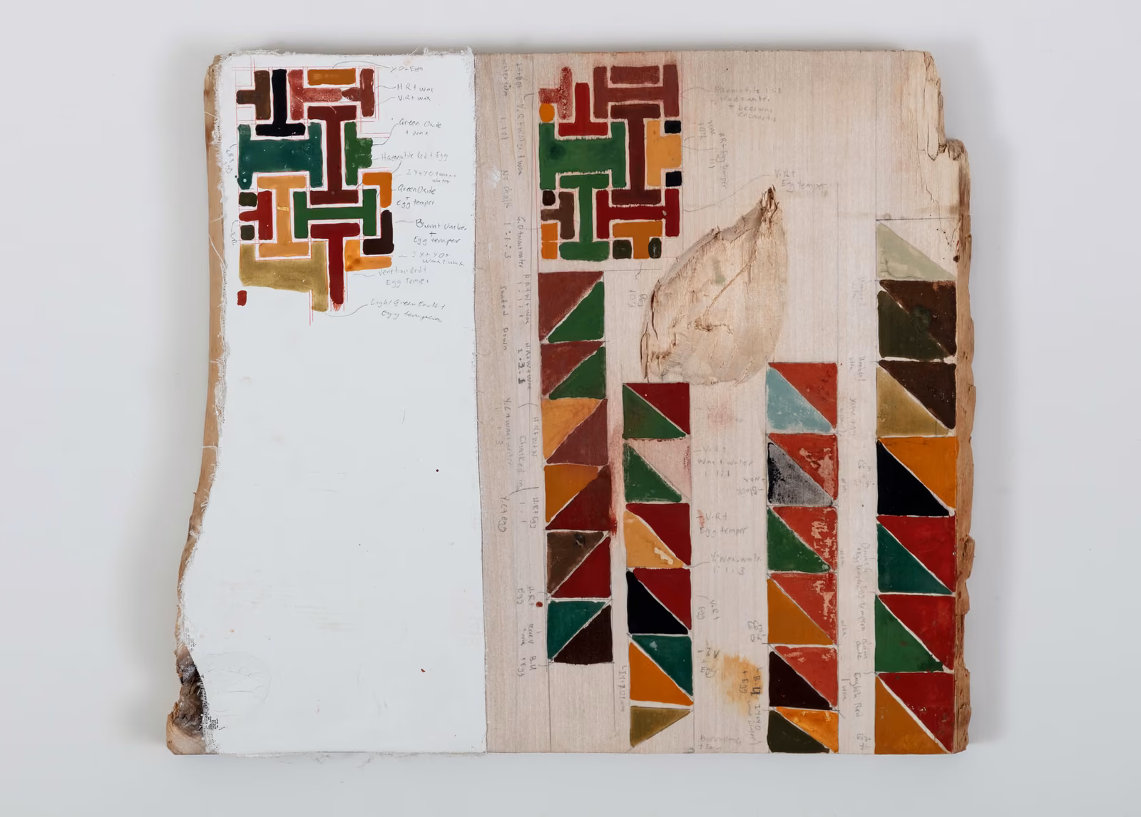 Open wooden board with geometric colour panels